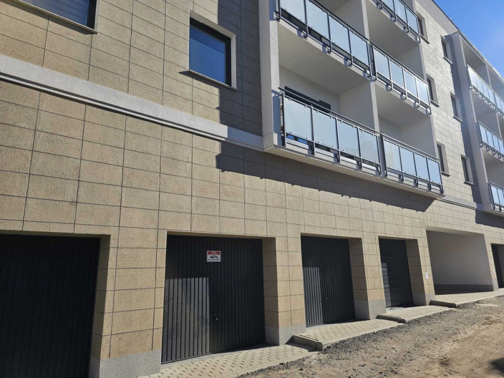 Komfortowy apartament w sercu miasta - 16240314